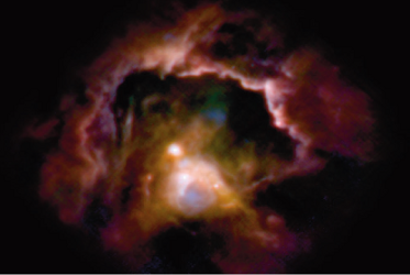 <b>Fig.1:</b> Image of the high-mass star forming region ISOSS J22164+6003 taken with the PACS instrument aboard HERSCHEL at 70 µm (blue), 100 µm (green) and 160 µm (red).